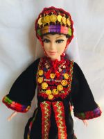 Doll is wearing Palestinian traditional clothes(thobe Al-Anbar ثوب العنبر, Embroidered Dress)